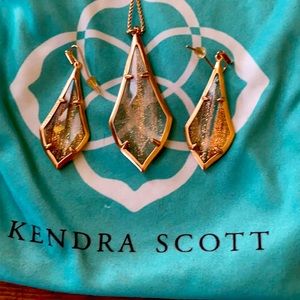 Kendra Scott Rose colored earrings & necklace
